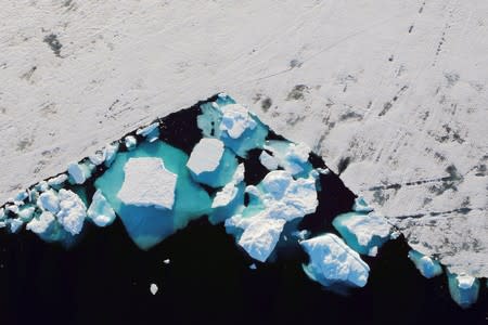 FILE PHOTO: In Greenland, a glacier's collapse shows climate impact