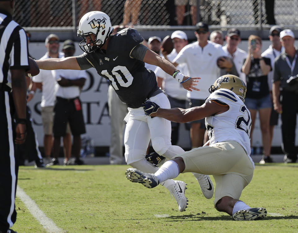 Central Florida quarterback McKenzie Milton (10) has been dynamic so far. (AP Photo/John Raoux)
