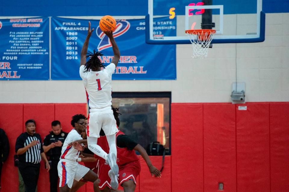 Pascagoula’s Dorian Mcmillian shoots a three pointer during a game against Harrison Central at Pascagoula High School on Tuesday, Dec. 5, 2023. Hannah Ruhoff/Sun Herald