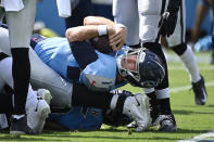 Tennessee Titans quarterback Ryan Tannehill (17) scores a touchdown on a 1-yard run against the Las Vegas Raiders in the first half of an NFL football game Sunday, Sept. 25, 2022, in Nashville, Tenn. (AP Photo/Mark Zaleski)