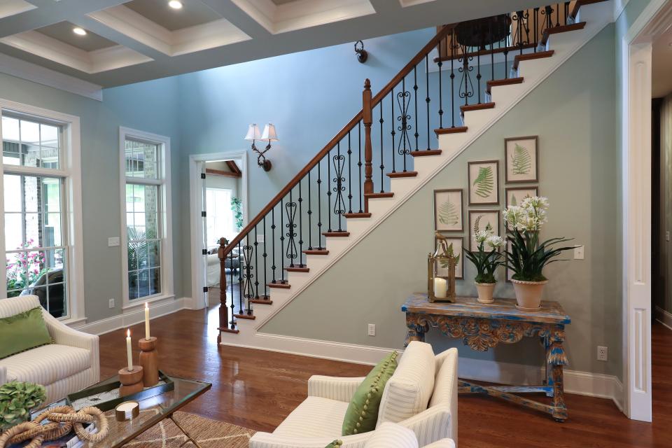 The staircase inside the home of Susan Bunch in Elizabethtown, Ky. on July 13, 2023.