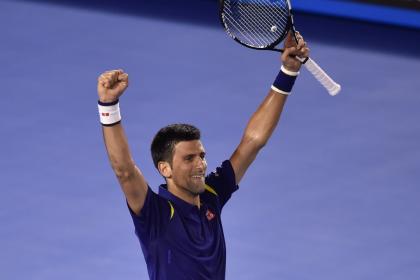 Serbia&#39;s Novak Djokovic celebrates victory against Switzerland&#39;s Roger Federer in the Australian Open semi-finals on January 28, 2016 (AFP Photo/Peter Parks)