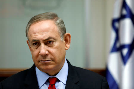 FILE PHOTO: Israeli Prime Minister Benjamin Netanyahu attends a cabinet meeting in Jerusalem March 16, 2017. REUTERS/Amir Cohen/File Photo