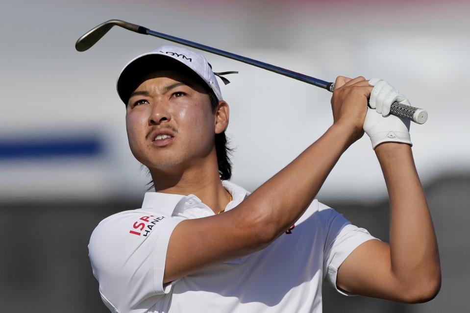 Min Woo Lee of Australia plays a shot on 10th hole during the final round of Abu Dhabi HSBC Golf Championship, in Abu Dhabi, United Arab Emirates, Sunday, Jan. 22, 2023. (AP Photo/Kamran Jebreili)