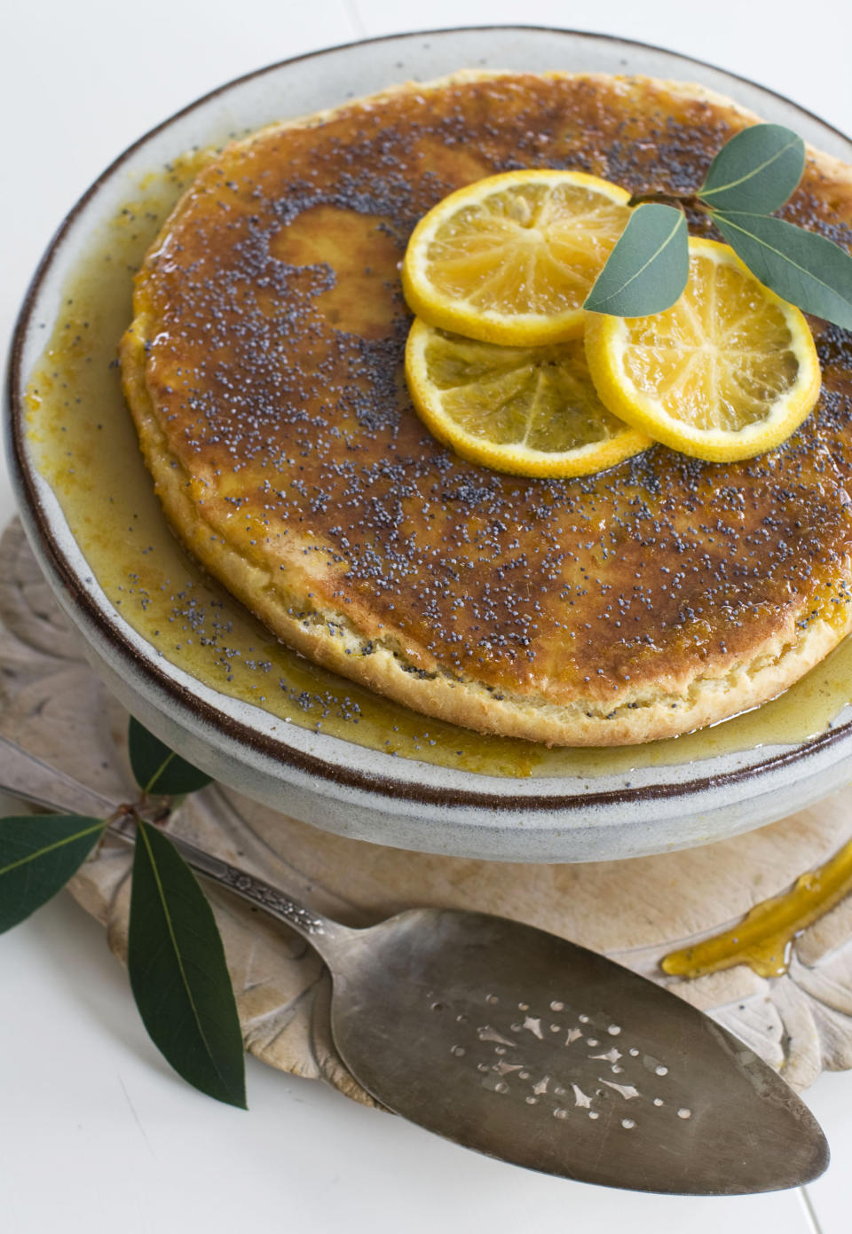 In this image taken on November 5, 2012, a Roman cheesecake with orange-scented honey is shown in Concord, N.H. (AP Photo/Matthew Mead)