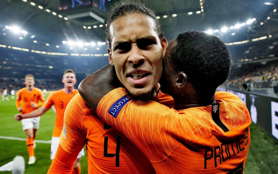 Virgil van Dijk celebrates his equaliser against Germany - Getty Images Europe