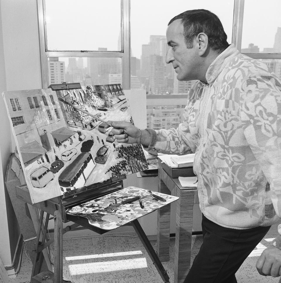 In his New York apartment, on June 3, 1969, Tony Bennett finds time to paint a city scene.