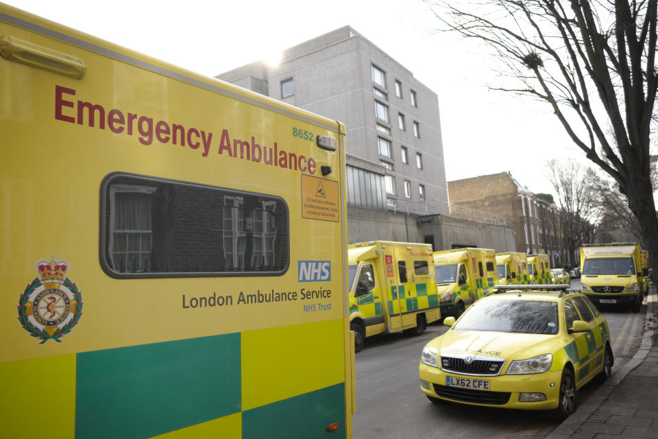 Ambulances are parked on a side street during a strike by members of the Unison union in the long-running dispute over pay and staffing, in London, Friday, Feb. 10, 2023.(AP Photo/Kirsty Wigglesworth)