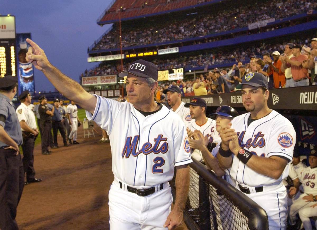 MLB Bobby Valentine throwing first pitch to Joe Torre at 9/11