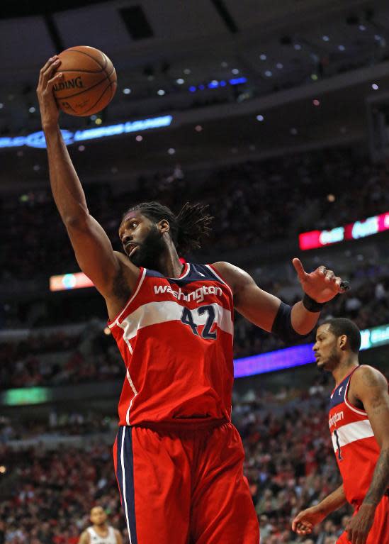 Nene of the Washington Wizards rebounds against the Chicago Bulls in Game Two of the Eastern Conference Quarterfinals during the NBA Playoffs at the United Center on April 22, 2014