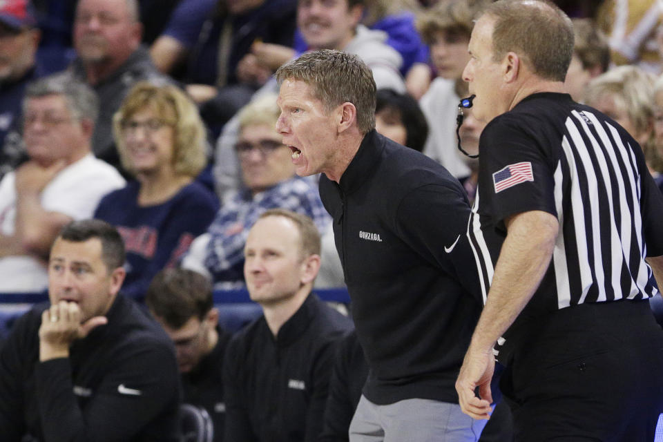 Gonzaga head coach Mark Few, center, directs his team during the first half of an NCAA college basketball game against Mississippi Valley State, Monday, Dec. 11, 2023, in Spokane, Wash. (AP Photo/Young Kwak)