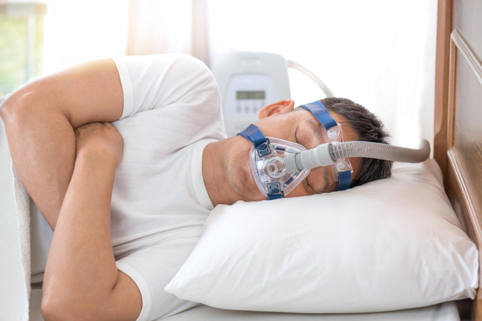 Happy and healthy senior man sleeping deeply on his left side without snoring