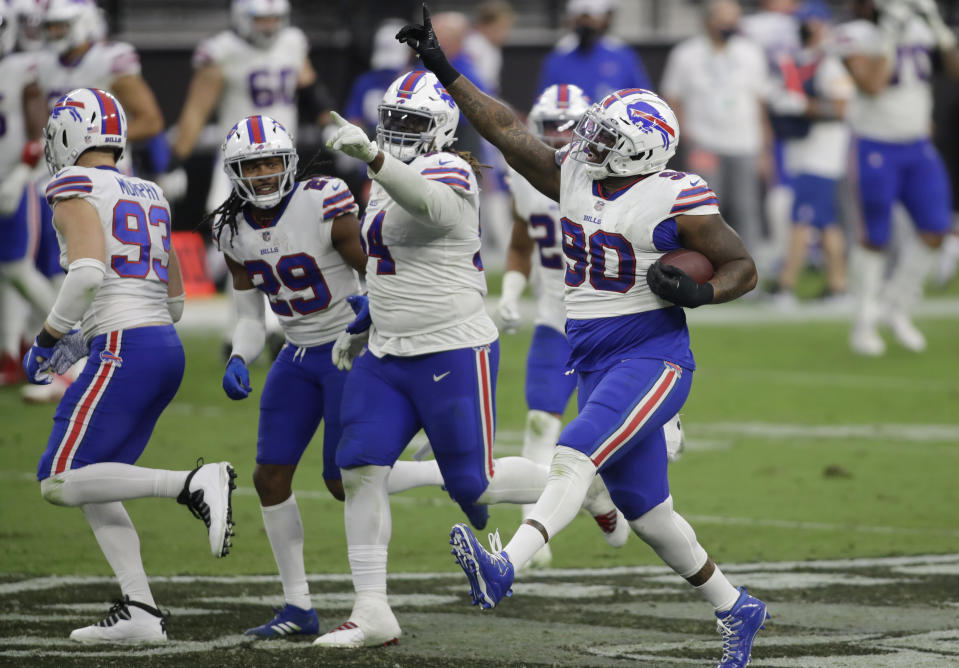 Buffalo Bills defensive tackle Quinton Jefferson (90) celebrates after recovering a fumble by the Las Vegas Raiders during the second half of an NFL football game, Sunday, Oct. 4, 2020, in Las Vegas. (AP Photo/Isaac Brekken)