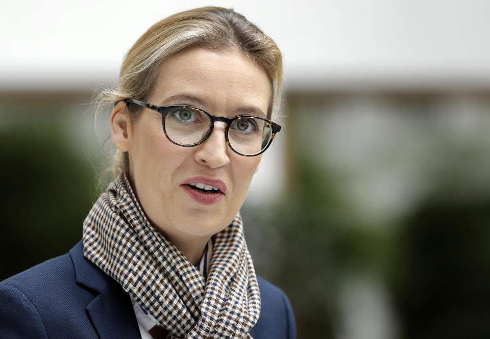 FILE - In this Aug. 21, 2017 photo Alice Weidel, then co-top candidate of the German AfD (Alternative for Germany) party for the upcoming general elections, awaits a press conference in Berlin, Germany. The co-leader of a far-right party in Germany is defending herself against suggestions she might have accepted campaign donations that were illegal. (AP Photo/Michael Sohn, file)