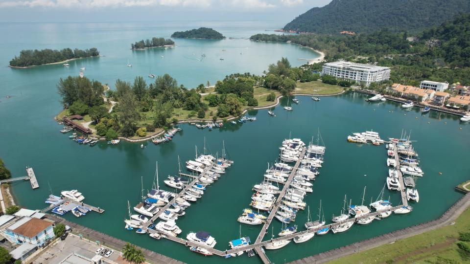 Aerial view of The private island of Paradise 101 and the surrounding marina bay. The Landmarks, Beaches and Tourist Attractions of Langkawi. Aerial photos of the famous Paradise 101 island taken on June 24th 2022
