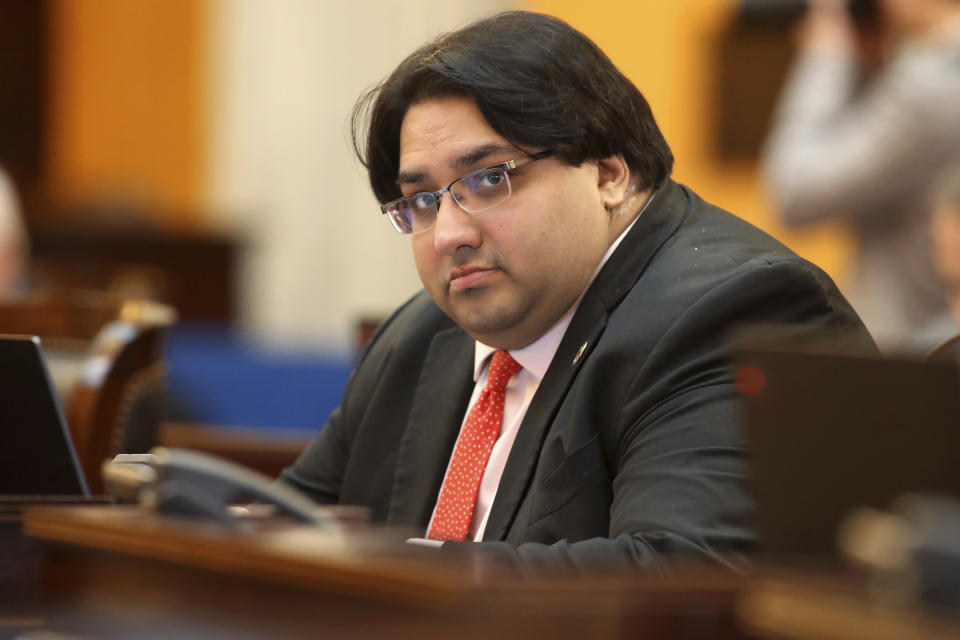 FILE - State Sen. Niraj Antani, R-6th District, listens during a debate in the Senate Chambers in Columbus, Ohio, Wednesday, Feb. 28, 2024. Antani is one of 11 candidates vying for the Republican nomination for a seat in Ohio’s 2nd Congressional District, which extends from suburban Cincinnati to the West Virginia border. The winner of the primary will face Democrat Samantha Meadows in the November general election. (AP Photo/Joe Maiorana, File)