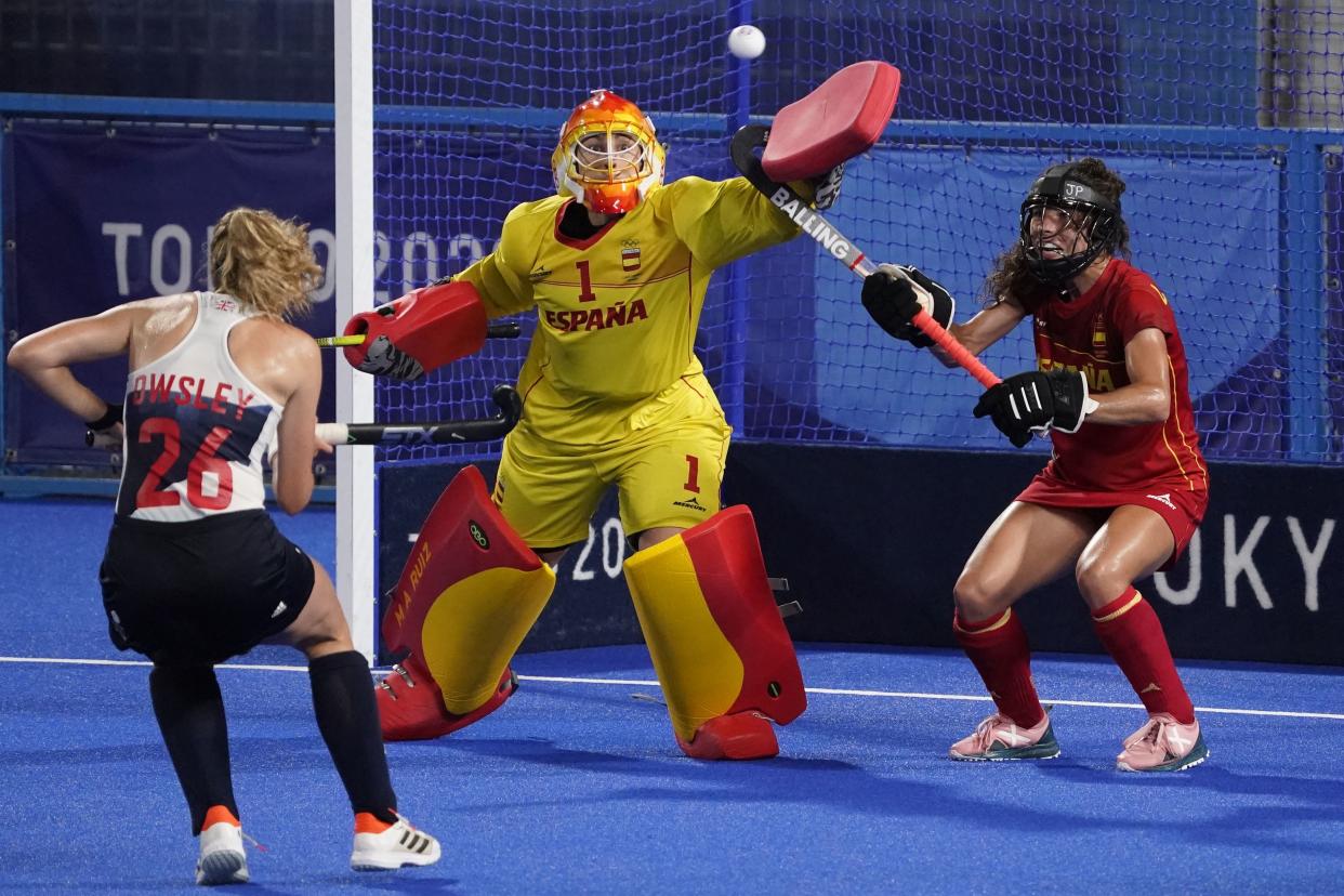 Spain's goalkeeper Maria de los Angeles Ruiz Castillo (1) is scored on by Britain during a women's field hockey match at the 2020 Summer Olympics, Monday, Aug. 2, 2021, in Tokyo, Japan.