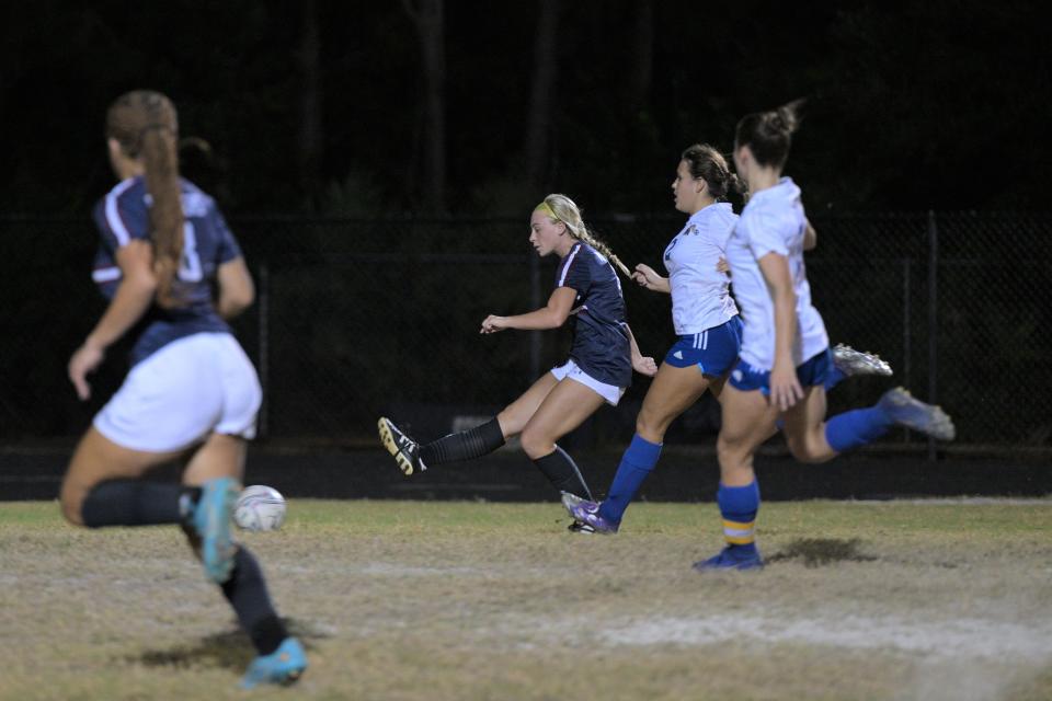 Dwyer's Kaitlin Gablemen lets loose a shot on target, scoring her second goal of the night against Martin County in the Panthers' 4-1 district semifinals victory on Jan. 30, 2023.
