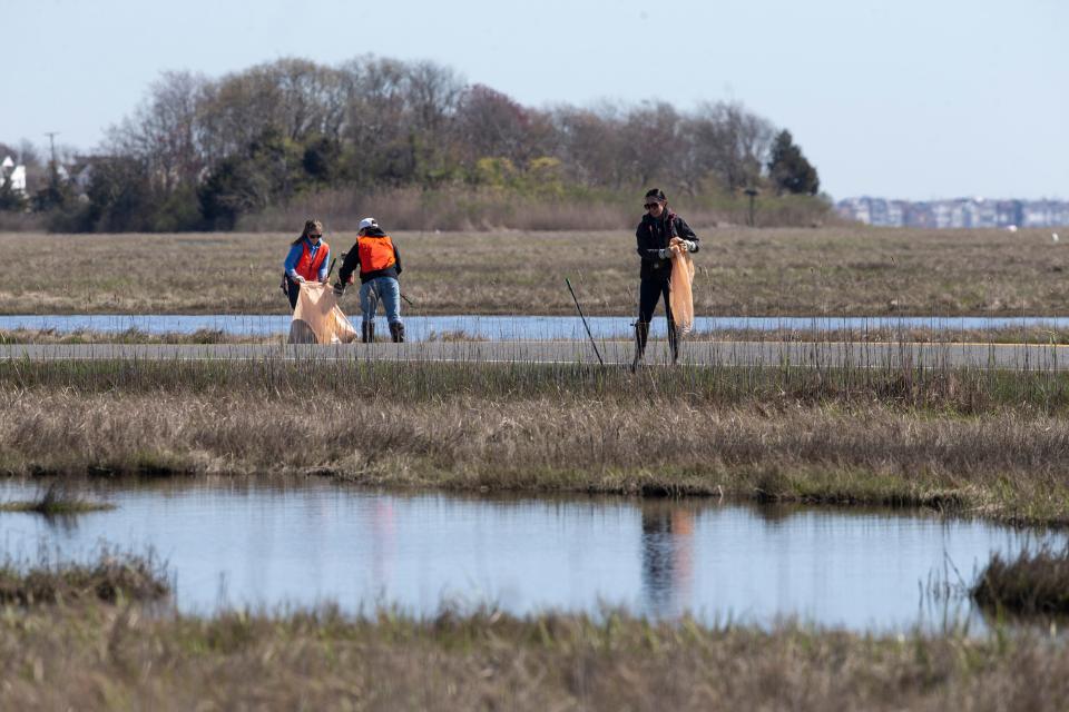 Karen Wisniewski, CJ Nicholson, and Kristina Roselli of NJDEP volunteers at the annual Barnegat Bay Blitz watershed-wide cleanup. 
Bayville, NJ
Tuesday, April 23, 2024