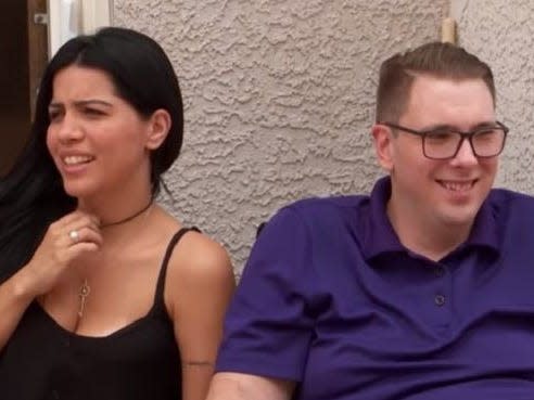 Larissa Dos Santos Lima and Colt Johnson sitting next to each other on "90 day fiance"