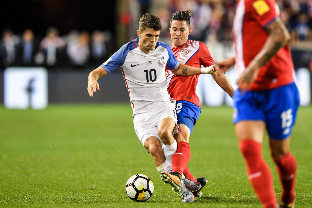 Christian Pulisic is challenged by Costa Rica's Jose Salvatierra. (Getty)