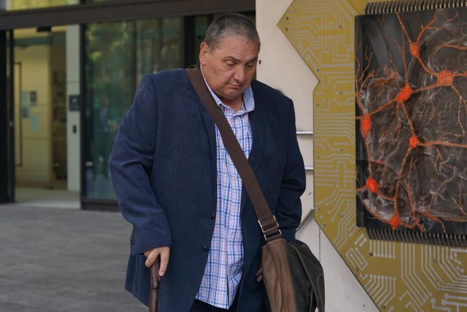 Anthony Elsom, one of six Metropolitan Police officers, leaving Westminster Magistrates’ Court in central London, after pleading guilty to charges of sending grossly offensive racist messages (Lucy North/PA Wire)