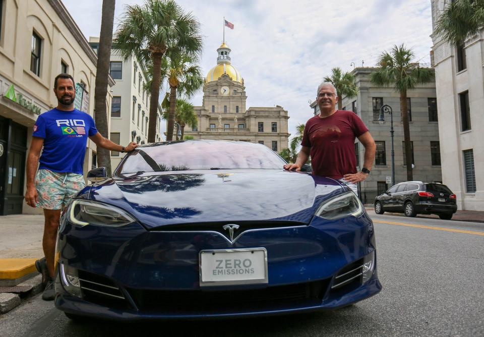 Andy Resende and Steve Schulte have owned their Tesla Model S since 2017 and often drive it on trips from Savannah to South Florida.