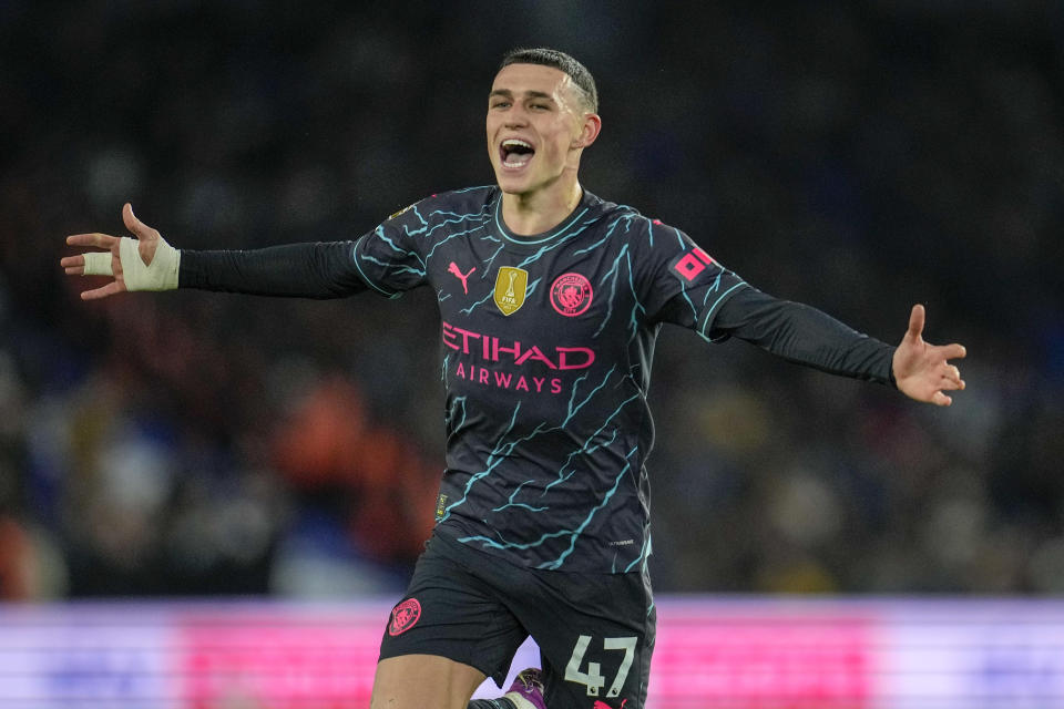 Manchester City's Phil Foden celebrates after scoring his side's second goal during the English Premier League soccer match between Brighton and Manchester City at the Falmer Stadium in Brighton, England, Thursday, April 25, 2024. (AP Photo/Kin Cheung)