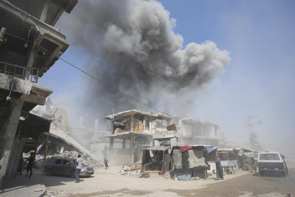 Smoke rises after Israeli shelling in Khan Younis, Gaza Strip, Monday, July 22, 2024. (AP Photo/Abdel Kareem Hana)