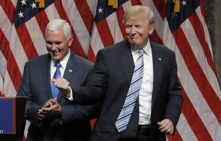 Donald Trump introduces Indiana Governor Mike Pence as his vice presidential running mate in New York City, July 16, 2016. REUTERS/Brendan McDermid