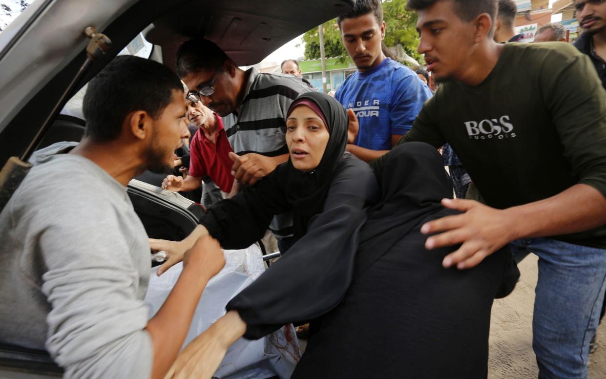 Relatives of the Palestinians who lost their lives in Israeli attacks over Nuseirat Refugee Camp