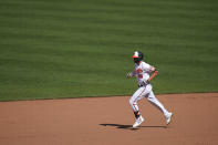 Baltimore Orioles' Trey Mancini runs the bases after hitting a three-run home run off Boston Red Sox relief pitcher Austin Brice during the seventh inning of a baseball game, Sunday, April 11, 2021, in Baltimore. Orioles Ramon Urias and Cedric Mullins scored on the home run. (AP Photo/Julio Cortez)