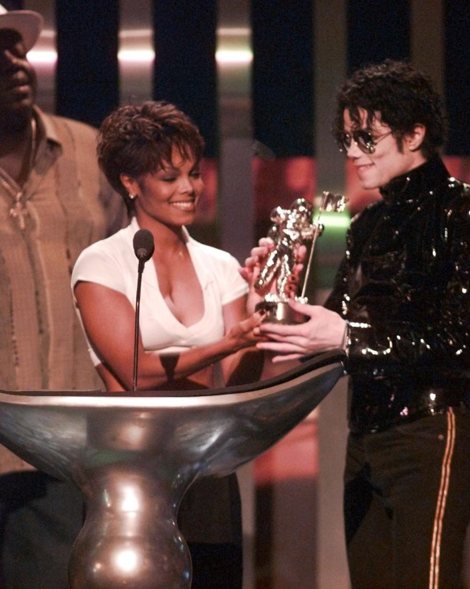 Janet Jackson with brother Michael Jackson on stage at the MTV Music Video Awards at Radio City Music Hall in New York on Sept. 7, 1995.