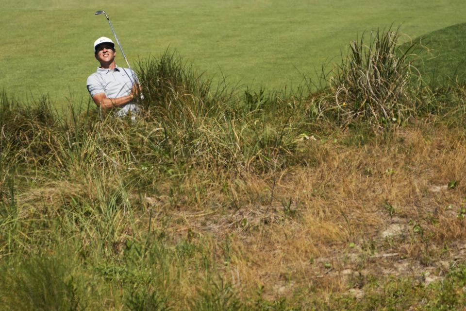 Cameron Champ looks for his shot on the 10th hole during the second round of the PGA Championship golf tournament on the Ocean Course Friday, May 21, 2021, in Kiawah Island, S.C. (AP Photo/David J. Phillip)