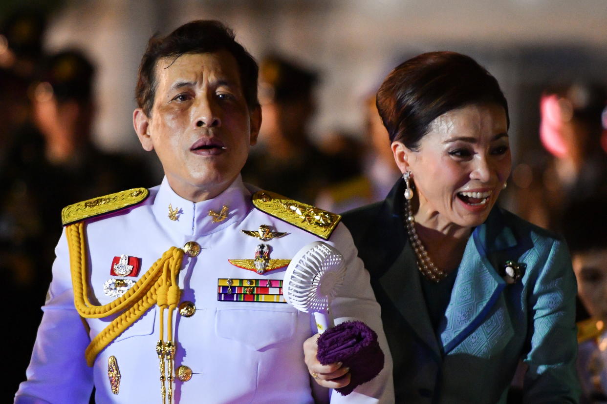 Thailand's King Maha Vajiralongkorn and Queen Suthida greet royalists in Bangkok, Thailand.