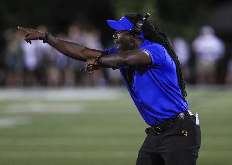 Former UofL football star and NFL Super Bowl Champion and MVP Deion Branch was on the sidelines for Carmel as an assistant coach for the Greyhounds as Carmel beat Trinity 49-38 Friday night at Marshall Stadium. 