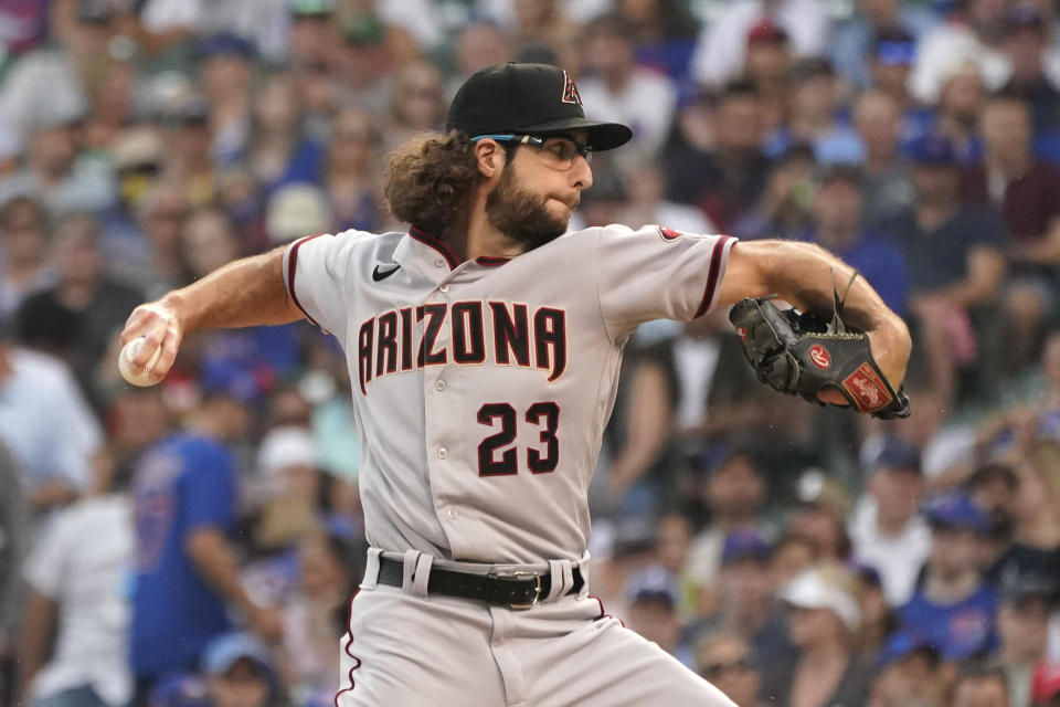 Arizona Diamondbacks starting pitcher Zac Gallen throws against the Chicago Cubs during the first inning of a baseball game in Chicago, Friday, July 23, 2021. (AP Photo/Nam Y. Huh)