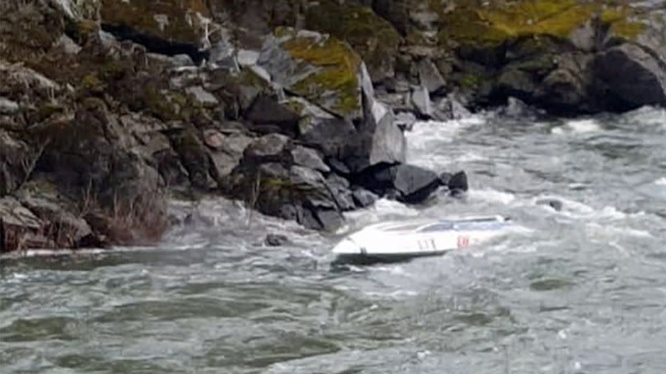 Onlookers feared the pair were trapped but they soon emerged relatively unscathed. Source: YouTube