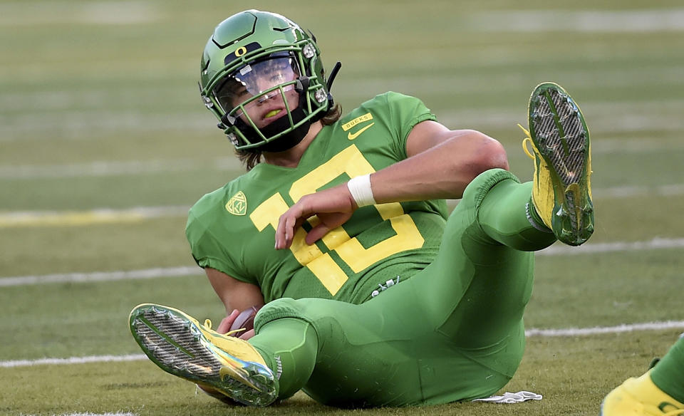 Will Oregon QB Justin Herbert be knocked by portions of the NFL for his academic interests? (Getty Images)