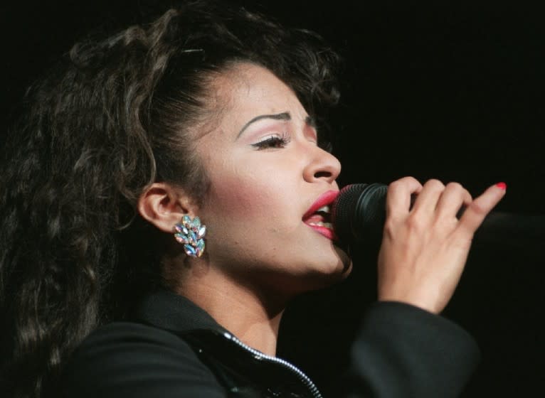 Latin singer Selena performing