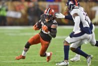 Cleveland Browns running back D'Ernest Johnson (30) runs with the ball against the Denver Broncos during the second half of an NFL football game, Thursday, Oct. 21, 2021, in Cleveland. (AP Photo/David Richard)
