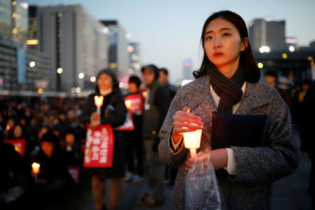 People attend a rally calling for impeached President Park Geun-hye's arrest in central Seoul, South Korea, March 10, 2017. REUTERS/Kim Hong-Ji