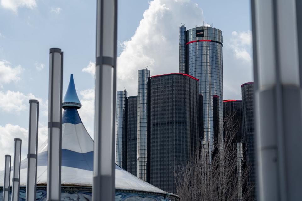 The Renaissance Center in downtown Detroit sits in the background along the Detroit RiverWalk on Thursday, March 11, 2021.