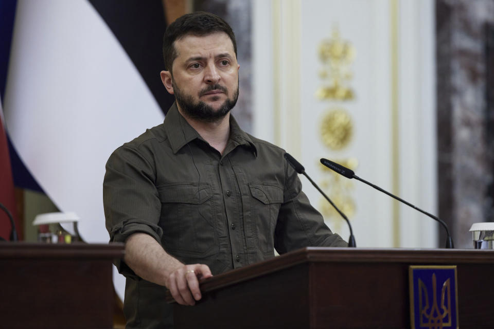 In this image provided by the Ukrainian Presidential Press Office, Ukrainian President Volodymyr Zelenskyy attends a news conference during his meeting with Lithuania's President Gitanas Nauseda, Polish President Andrzej Duda, Latvian President Egils Levits and Estonia's President Alar Karis in Kyiv, Ukraine, Wednesday, April 13, 2022. (Ukrainian Presidential Press Office via AP)