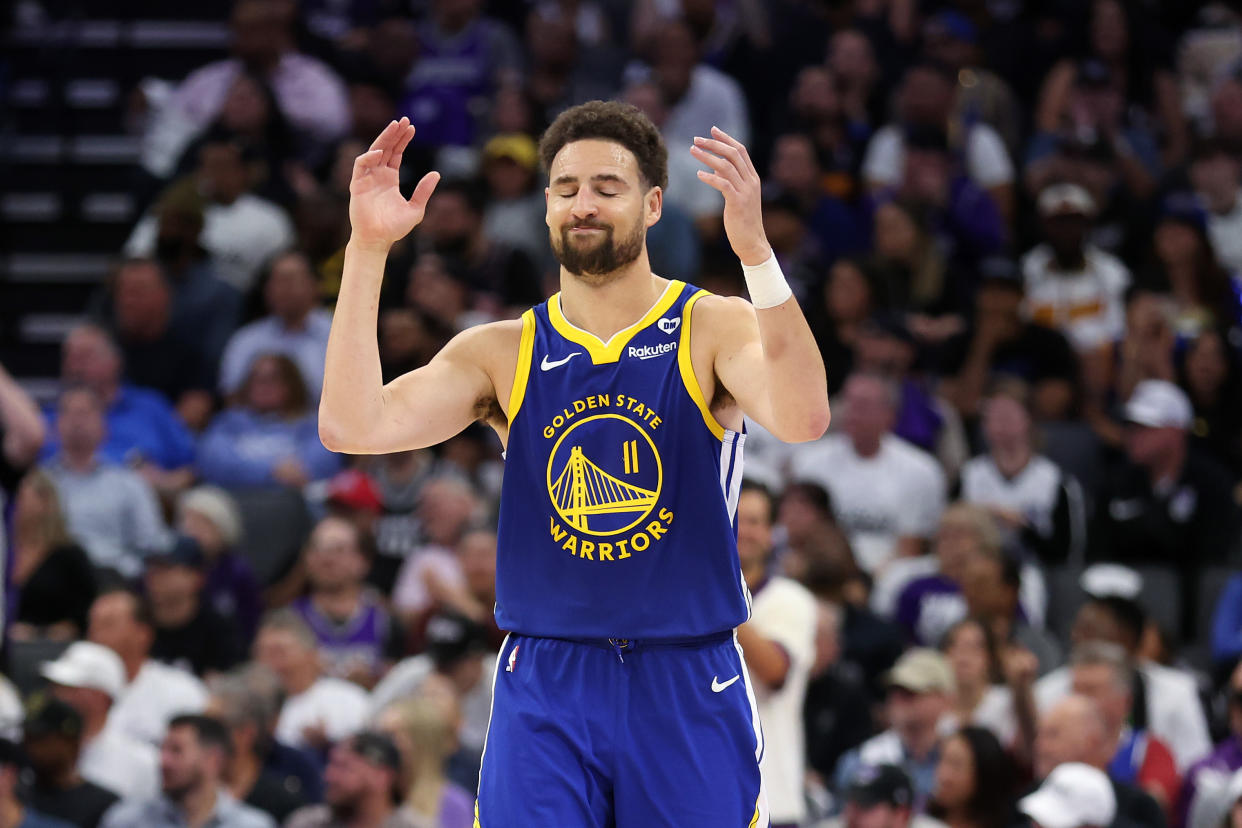 SACRAMENTO, CALIFORNIA - APRIL 16: Klay Thompson #11 of the Golden State Warriors reacts after missing a shot against the Sacramento Kings in the second half during the Play-In Tournament at Golden 1 Center on April 16, 2024 in Sacramento, California.  NOTE TO USER: User expressly acknowledges and agrees that, by downloading and or using this photograph, User is consenting to the terms and conditions of the Getty Images License Agreement.  (Photo by Ezra Shaw/Getty Images)