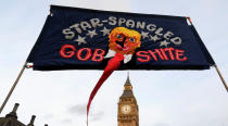 <p>Demonstrators hold a placard during a protest against President Trump in London, Feb. 20, 2017. (Toby Melville/Reuters) </p>