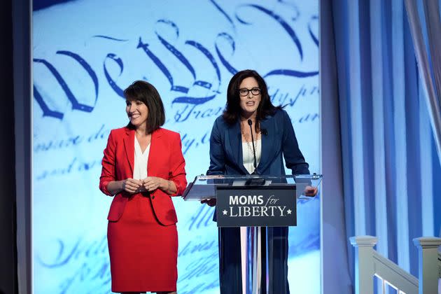 Moms for Liberty co-founders Tina Descovich, left, and Tiffany Justice speak at the organization's June summit in Philadelphia.