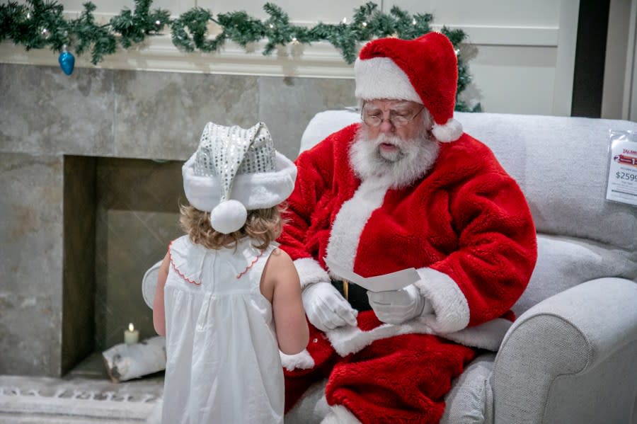 The Angel Tree Christmas Party at Talsma Furniture near Grand Rapids on Nov. 30, 2023. (Michael Buck/WOOD TV8)