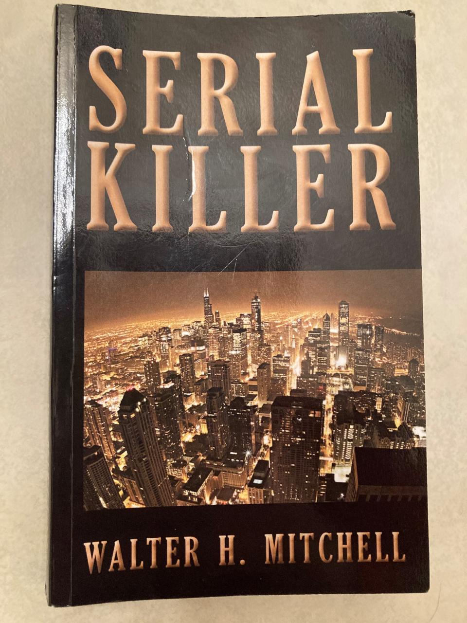 The front of a 2012 self-published novel called "Serial Killer" by Walter Mitchell.