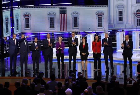 Candidates pose together before the start of the first U.S. 2020 presidential election Democratic candidates debate in Miami, Florida, U.S.,